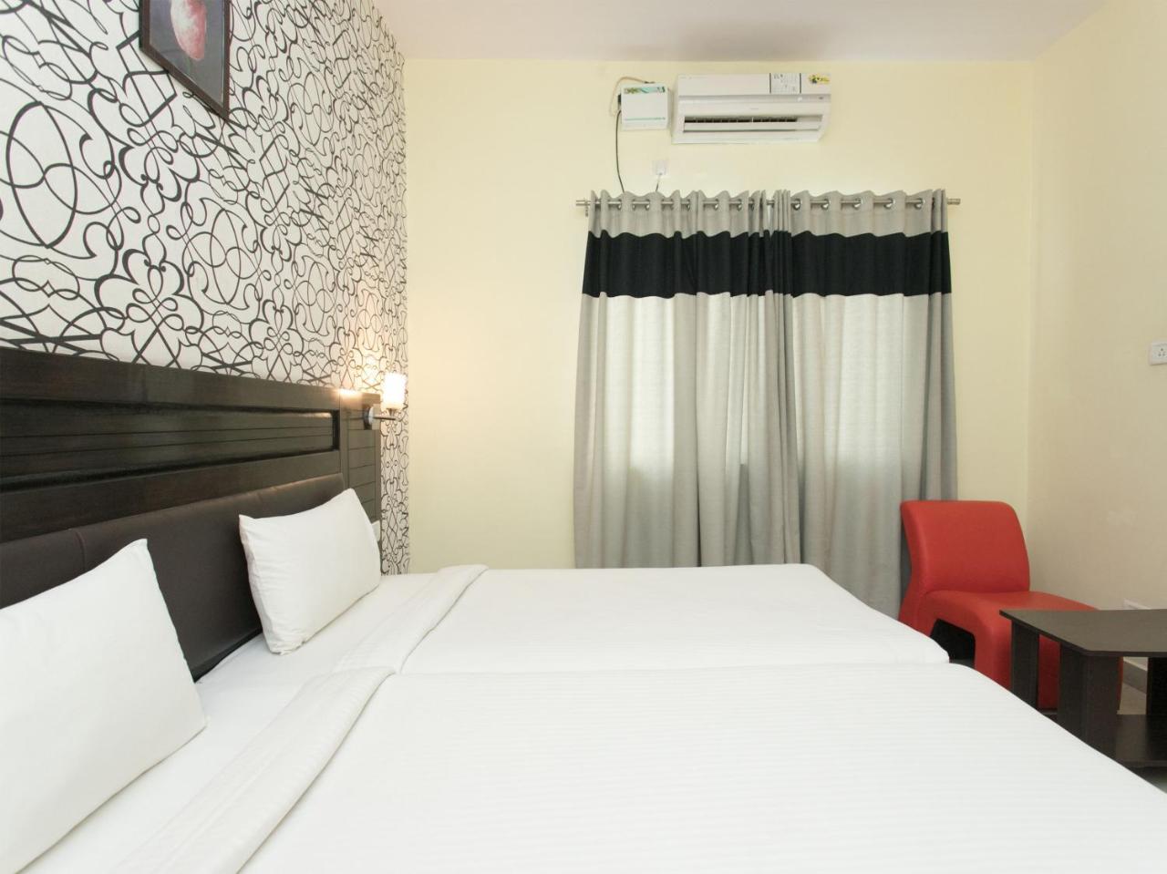 Oyo 10378 Hotel Hibiscus Mayflower Bangalore Bagian luar foto