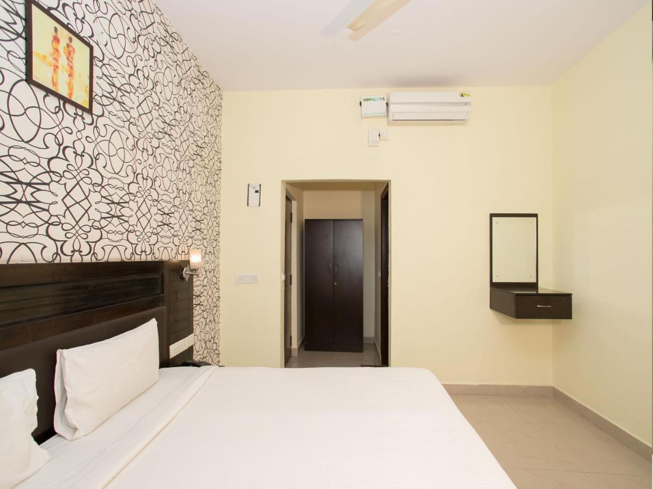 Oyo 10378 Hotel Hibiscus Mayflower Bangalore Bagian luar foto